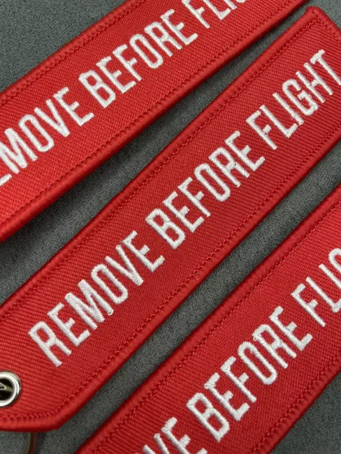 Тканевый брелок REMOVE BEFORE FLIGHT Изъять Перед полетом