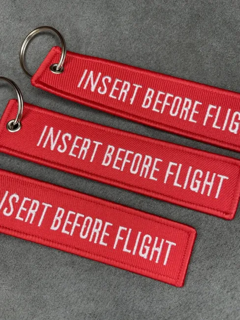 Тканевый брелок Insert Before Flight Вставить перед полетом