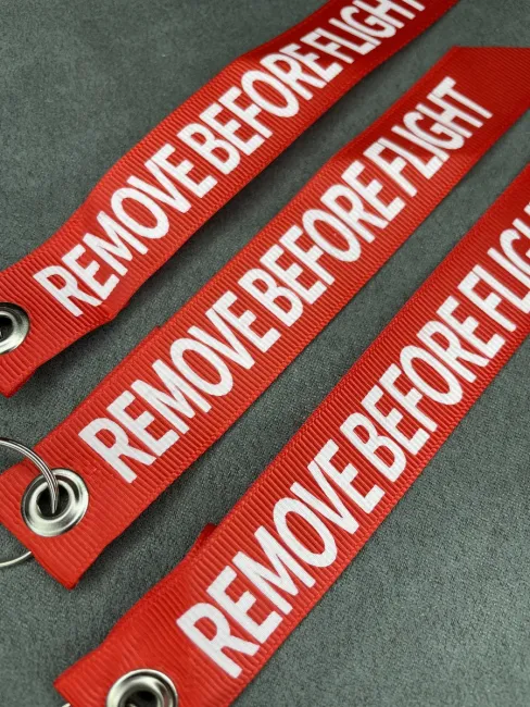 Тканевый брелок лента Remove Before Flight