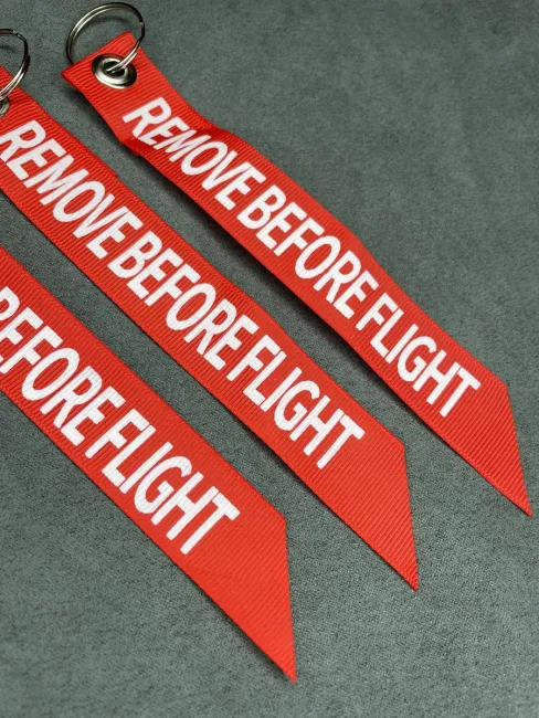 Тканевый брелок лента Remove Before Flight