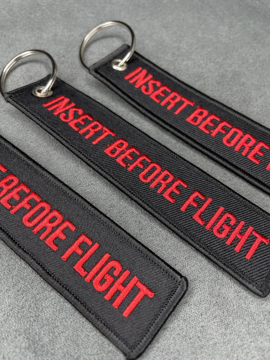 Тканевый брелок Insert Before Flight Вставить перед полетом